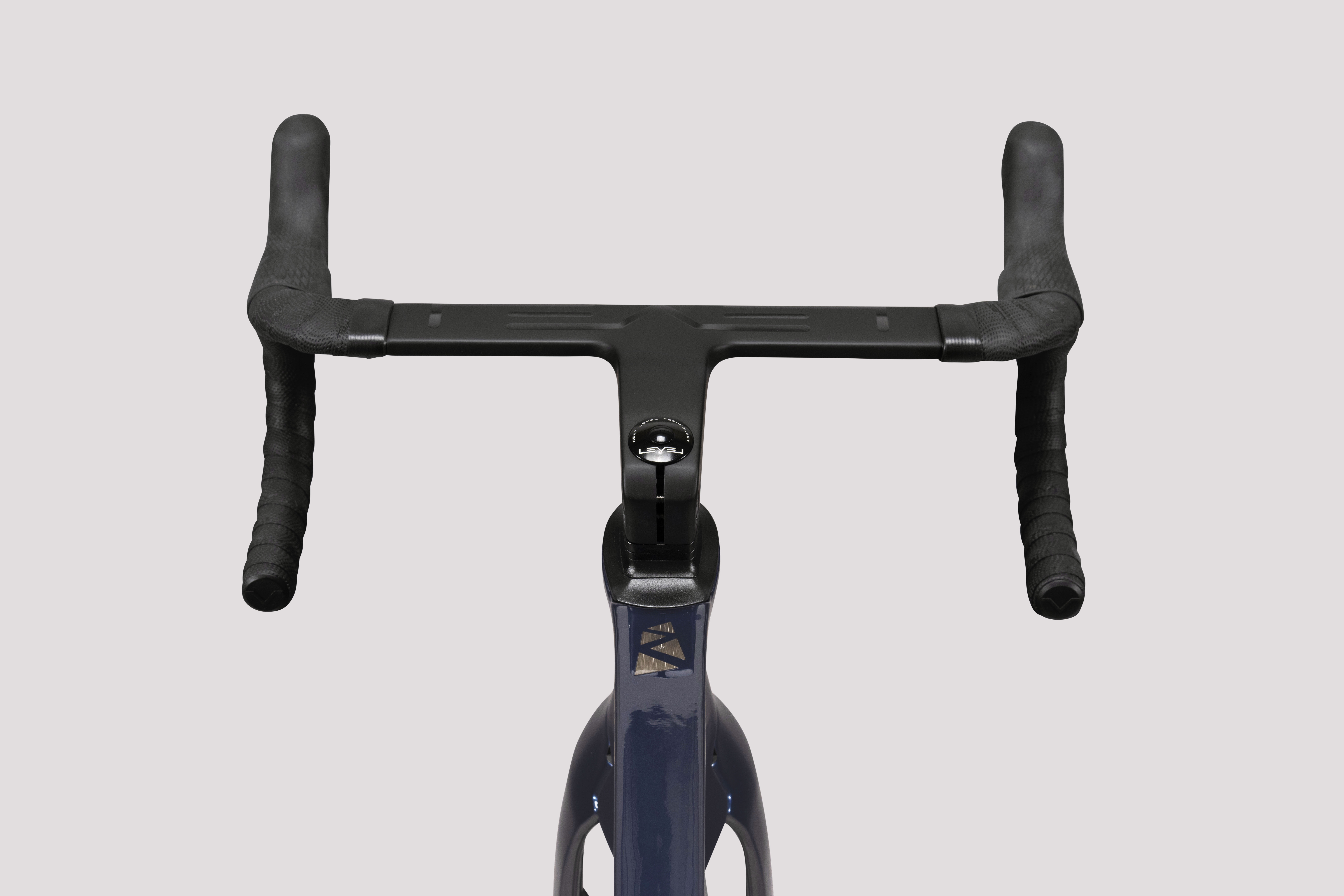 Level 5 carbon integrated road bar and stem outlet